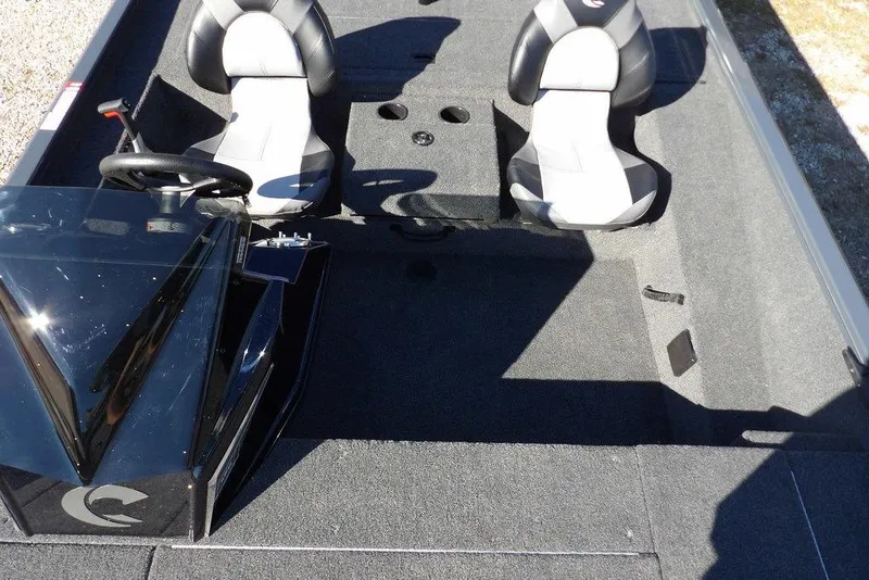 Slide: The Image of 2026 Crestliner XFC 189 boat interior with dual seats and steering console. - 19