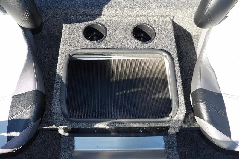 Slide: The Image of 2026 Crestliner XFC 189 boat interior with cup holders and seating area. - 23