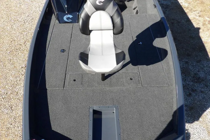 Slide: The Image of 2026 Crestliner XFC 189 boat interior with gray carpet and a single seat. - 28