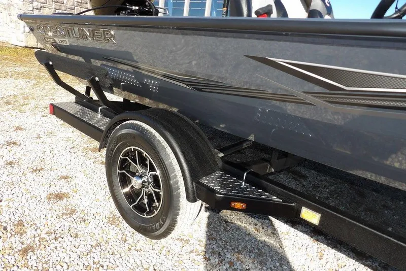 Slide: The Image of 2026 Crestliner XFC 189 boat on trailer, showcasing sleek design and modern features. - 40