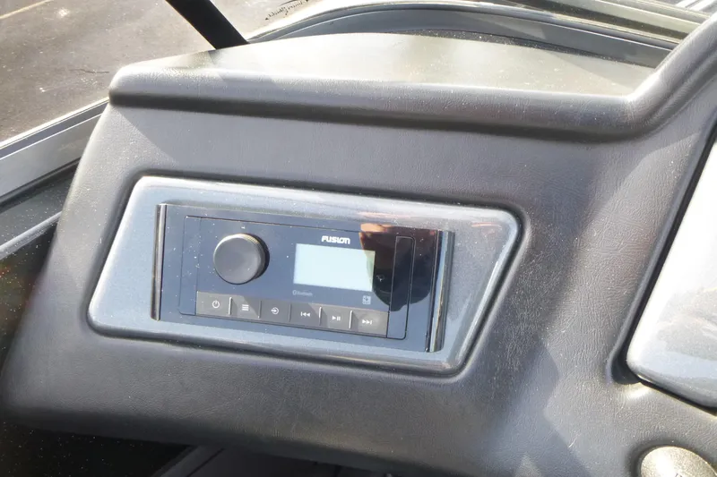 Slide: The Image of 2008 Ranger 620 VS boat dashboard with Fusion audio system. - 16