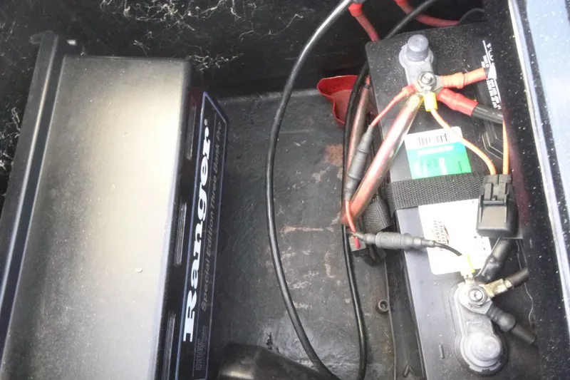Slide: The Image of 2008 Ranger 620 VS boat battery compartment with wiring and connections. - 18