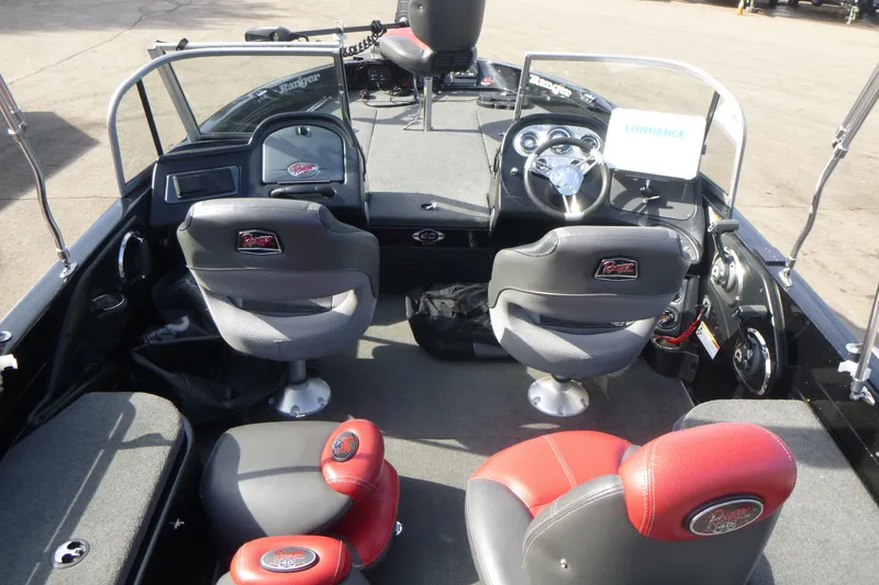 Slide: The Image of 2008 Ranger 620 VS boat interior with steering wheel and seating. - 8
