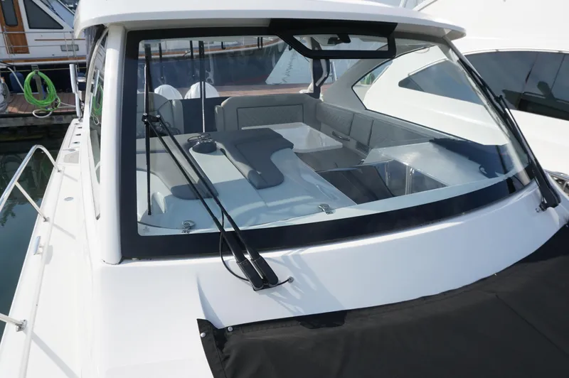 Slide: The Image of 2023 Pursuit OS 355 Offshore boat with spacious cockpit and modern design. - 24