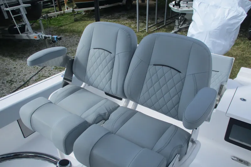 Slide: The Image of Luxurious seating on 2026 Sportsman Masters 247 Bay Boat, featuring diamond-stitched upholstery. - 12