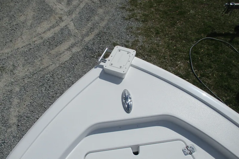 Slide: The Image of Bow of 2026 Sportsman Masters 247 Bay Boat on gravel and grass background. - 19