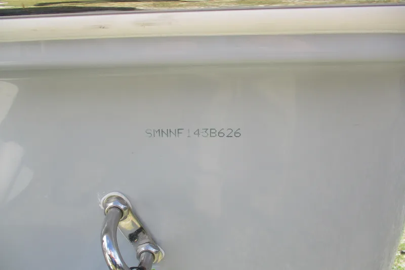 Slide: The Image of 2026 Sportsman Masters 247 Bay Boat hull identification number and cleat detail. - 21