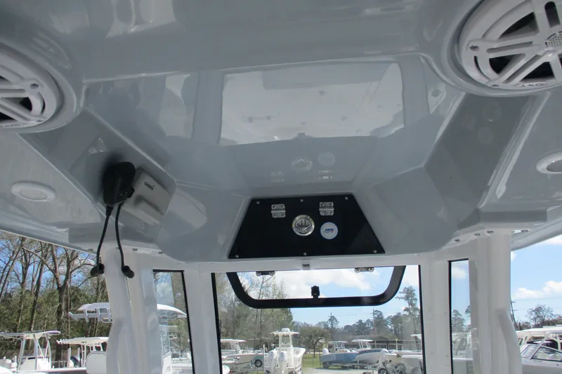 Slide: The Image of 2026 Sportsman Masters 247 Bay Boat interior with speakers and control panel. - 6