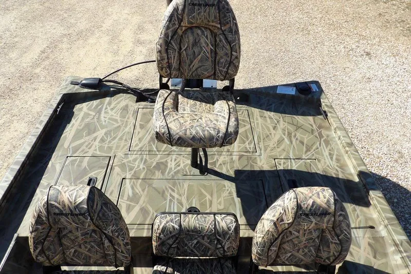 Slide: The Image of 2026 Crestliner XFC 189 boat with camouflage seating and deck design. - 17