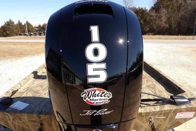 Slide: The Image of 2026 Crestliner XFC 189 boat with Mercury 105 JetPower engine, outdoors. - 29