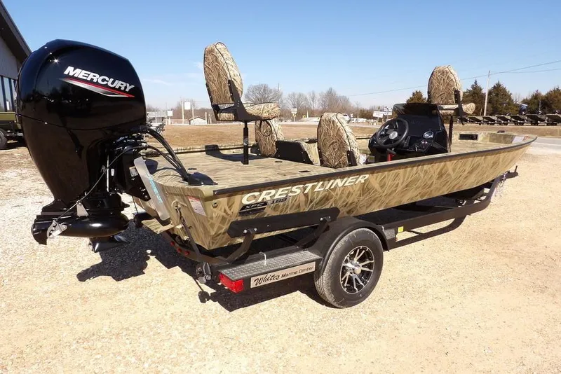 Slide: The Image of 2026 Crestliner XFC 189 fishing boat with Mercury engine on trailer. - 9