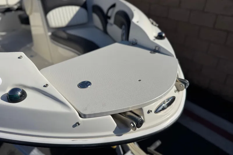 Slide: The Image of 2018 Stingray 208 LS boat bow with seating and navigation light. - 11