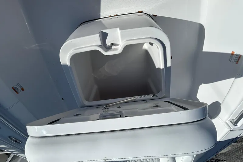 Slide: The Image of Open storage compartment on 2026 Sportsman Masters 267OE Bay Boat. - 9