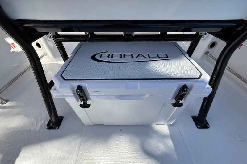 Slide: The Image of 2024 Robalo R230 Center Console cooler storage under seat. - 20