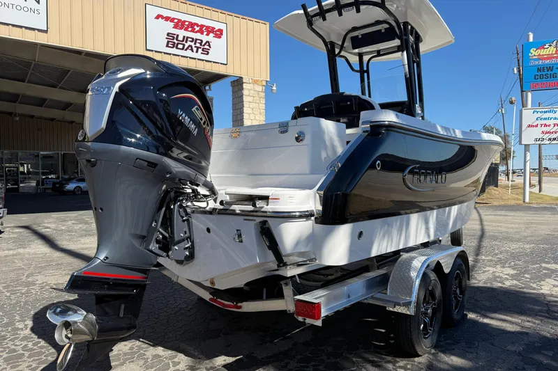 Slide: The Image of 2024 Robalo R230 Center Console boat with Yamaha engine on trailer. - 3