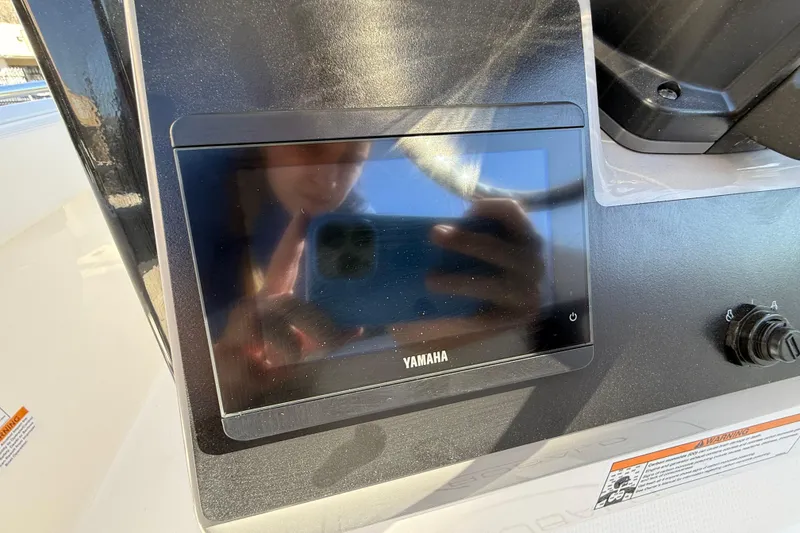 Slide: The Image of Yamaha display on 2024 Robalo R230 Center Console boat dashboard. - 44