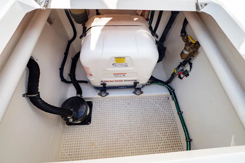 Slide: The Image of Engine compartment of 2019 Intrepid 407 Cuddy with generator and wiring. - 41