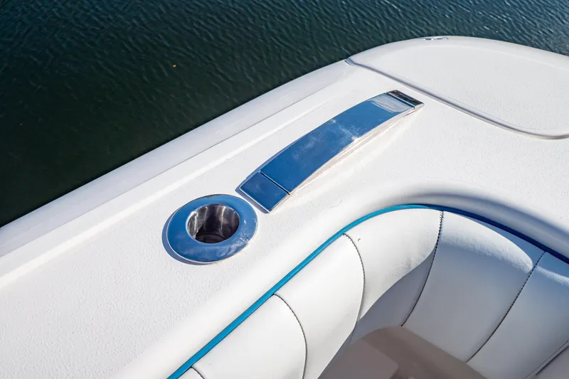 Slide: The Image of 2019 Intrepid 407 Cuddy boat detail with cup holder and sleek design. - 73