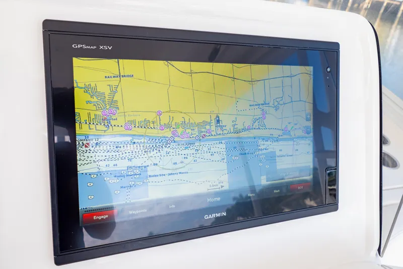 Slide: The Image of Garmin GPS display on 2019 Intrepid 407 Cuddy boat, showing navigational map. - 77