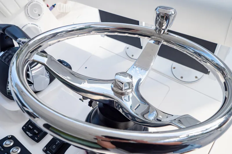 Slide: The Image of Steering wheel of 2019 Intrepid 407 Cuddy boat, shiny chrome finish. - 88