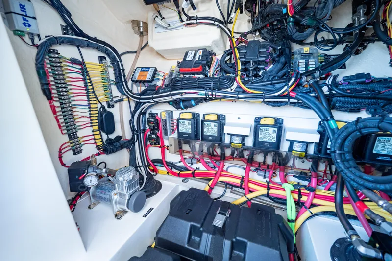 Slide: The Image of Electrical system of a 2019 Intrepid 407 Cuddy boat, showcasing wiring and components. - 94