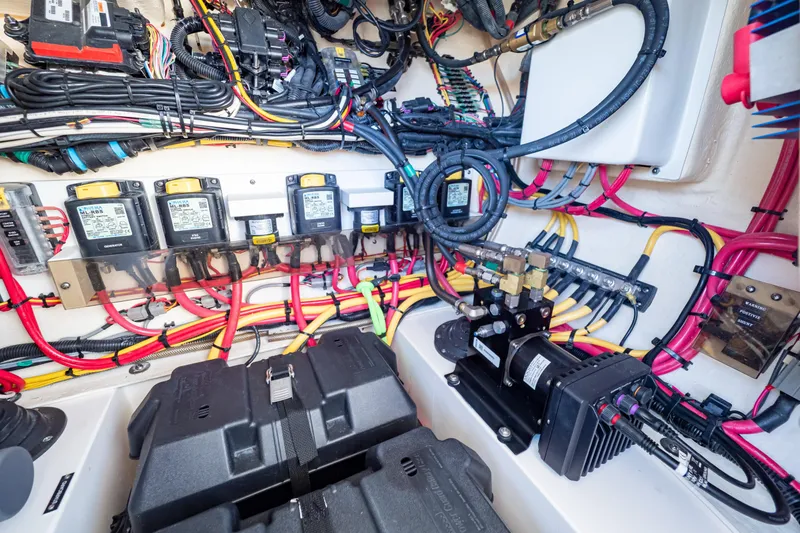 Slide: The Image of Electrical system of a 2019 Intrepid 407 Cuddy boat, showcasing wiring and components. - 95