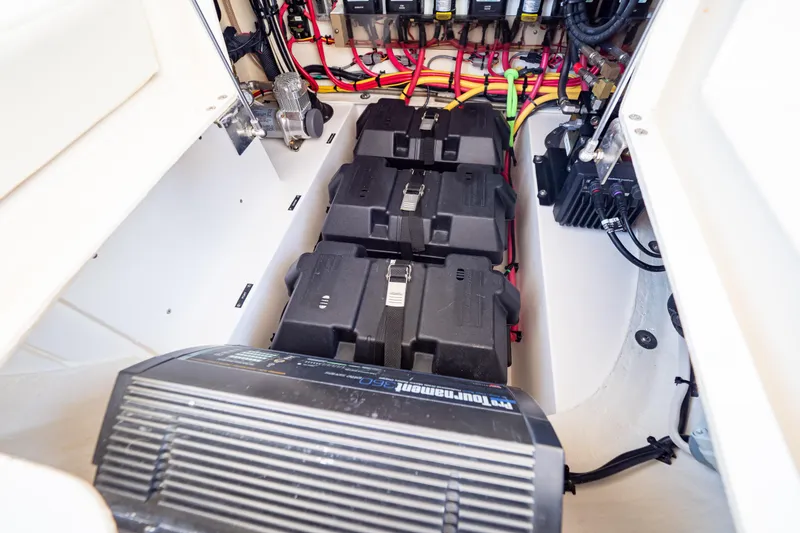 Slide: The Image of Electrical system of a 2019 Intrepid 407 Cuddy boat, featuring batteries and wiring. - 96