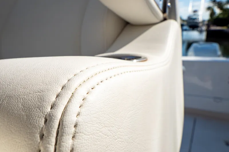 Slide: The Image of Luxurious leather seating detail on 2019 Intrepid 407 Cuddy boat. - 99
