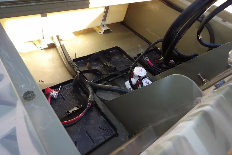 Slide: The Image of Interior view of 2026 Crestliner 1860 Retriever SC boat wiring and components. - 39