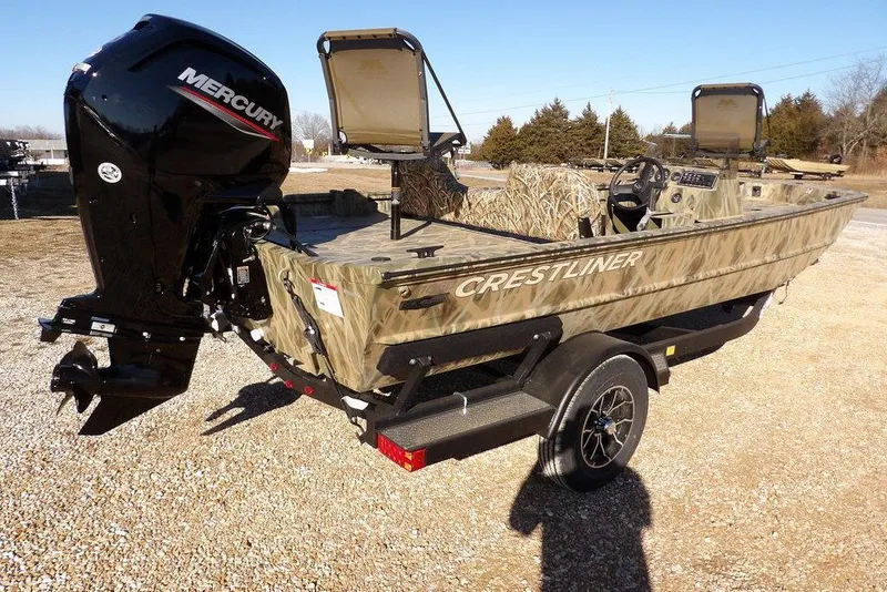 Slide: The Image of 2026 Crestliner 1860 Retriever SC boat with Mercury engine on a trailer. - 8