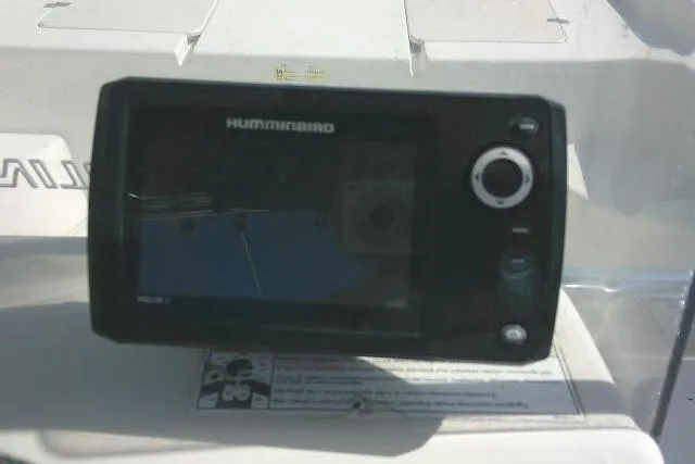 Slide: The Image of Humminbird fish finder on 2013 Carolina Skiff 218 DLV boat dashboard. - 19