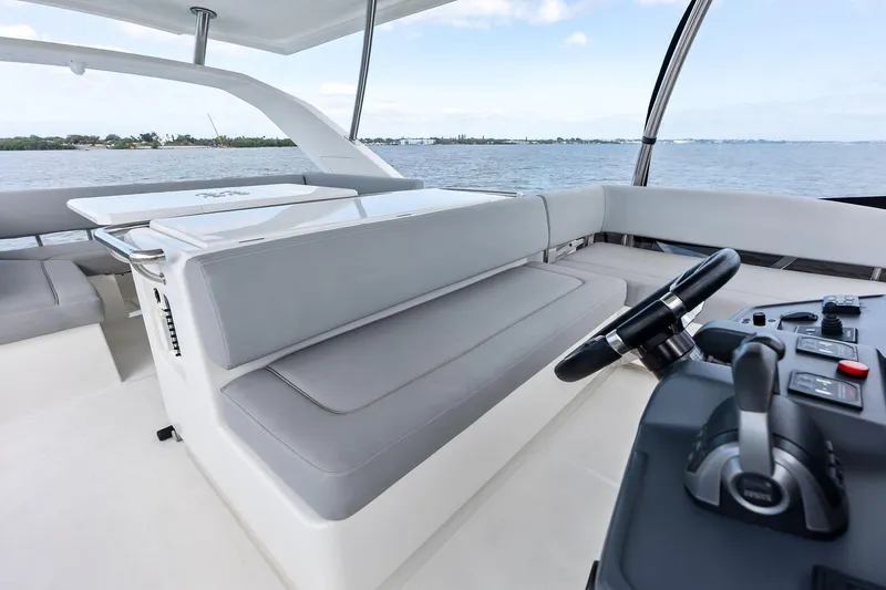 Slide: The Image of Interior view of 2021 Aquila 44 Yacht with helm and seating area. - 35