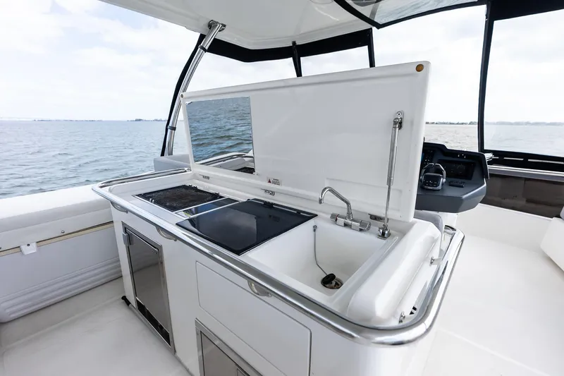 Slide: The Image of Luxury kitchen area on 2021 Aquila 44 Yacht with ocean view. - 40