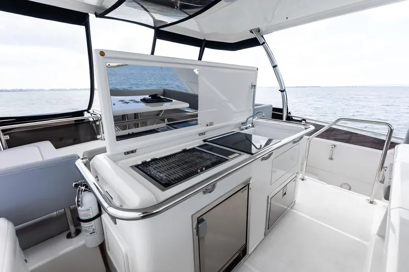 Slide: The Image of Outdoor kitchen on 2021 Aquila 44 Yacht with ocean view. - 41
