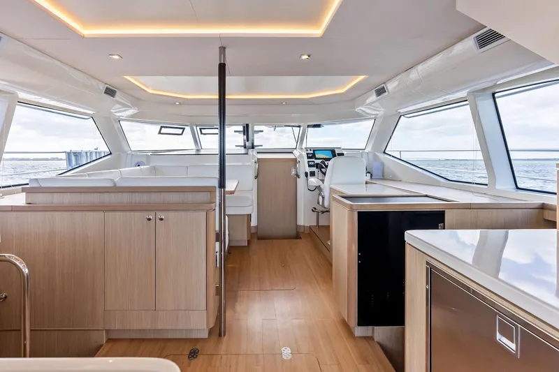 Slide: The Image of Luxurious interior of 2021 Aquila 44 Yacht with modern design and panoramic windows. - 48