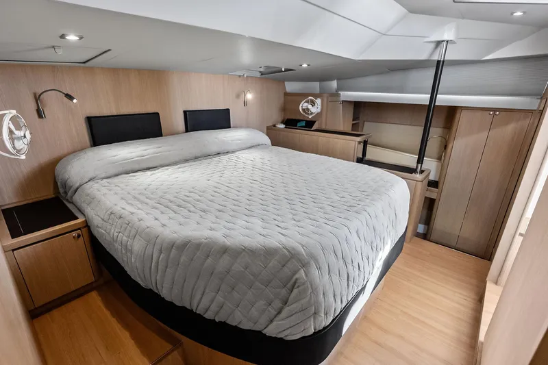 Slide: The Image of Luxurious bedroom interior of 2021 Aquila 44 Yacht with modern design and cozy bedding. - 64