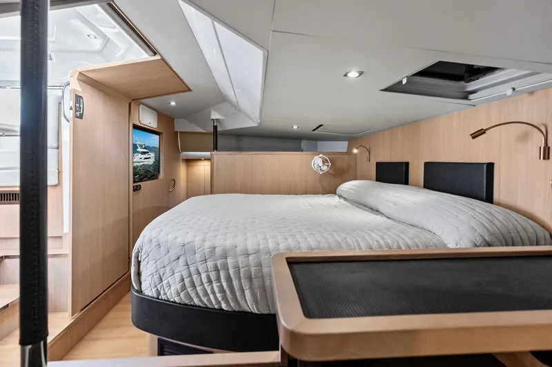 Slide: The Image of Luxurious bedroom interior of 2021 Aquila 44 Yacht with modern design and cozy bedding. - 65
