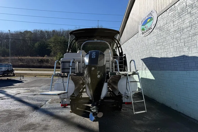 Slide: The Image of 2019 Harris Solstice DC 230 boat with powerful engine, parked outside Water Workz Marine. - 4