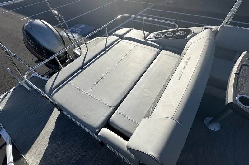 Slide: The Image of 2021 Bennington 23 LSB boat with spacious seating and modern design. - 15