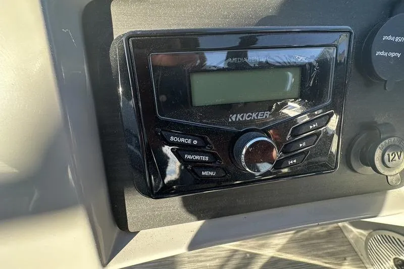 Slide: The Image of Kicker media center on 2021 Bennington 23 LSB boat dashboard. - 16