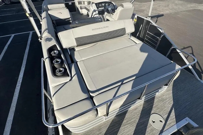 Slide: The Image of 2021 Bennington 23 LSB pontoon boat with spacious seating and modern design. - 2