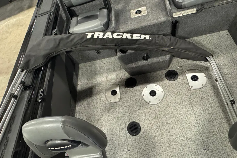 Slide: The Image of 2020 Tracker Targa V-19 Combo Tournament Edition boat interior with seating and storage compartments. - 12