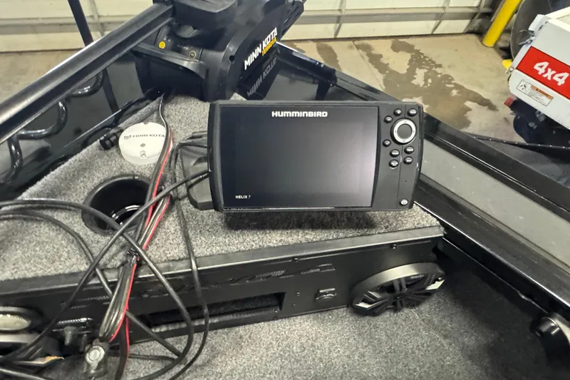 Slide: The Image of 2020 Tracker Targa V-19 Combo boat with Humminbird Helix 7 fish finder and Minn Kota trolling motor. - 22