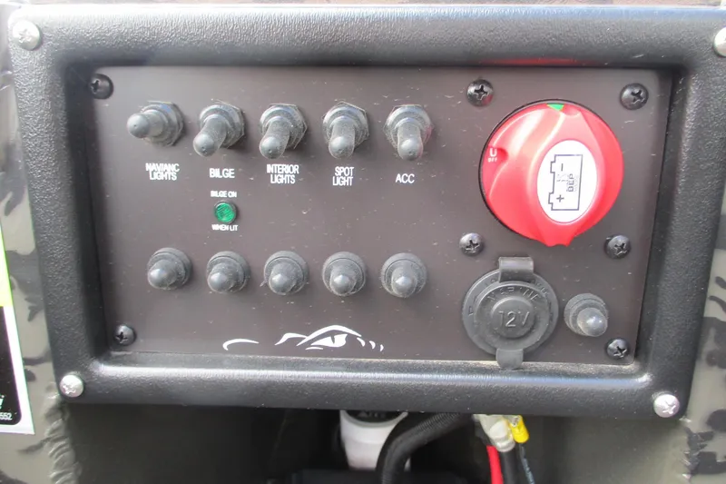 Slide: The Image of Control panel of 2026 Gator Tail 1754 Extreme boat with switches and battery dial. - 10