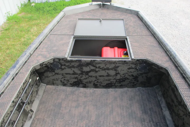 Slide: The Image of 2026 Gator Tail 1754 Extreme boat interior with storage compartment open. - 7