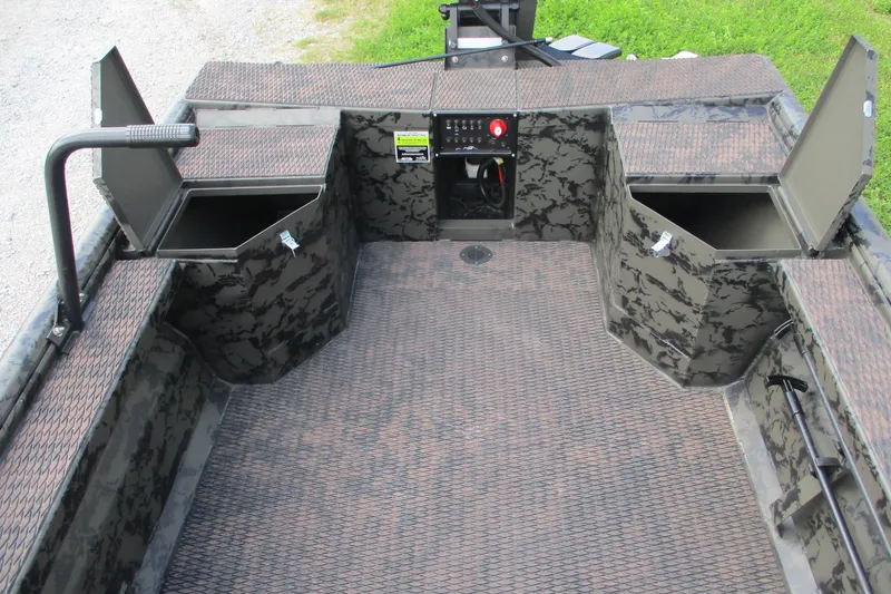 Slide: The Image of 2026 Gator Tail 1754 Extreme boat interior with storage compartments and camo design. - 9