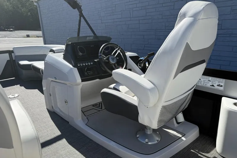 Slide: The Image of 2022 Viaggio Diamante S 26 boat interior with modern helm and seating. - 11