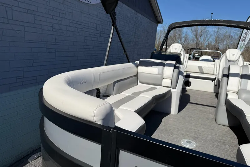 Slide: The Image of 2022 Viaggio Diamante S 26 pontoon boat with luxurious seating and modern design. - 8