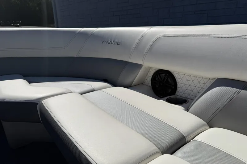 Slide: The Image of Luxurious seating in 2022 Viaggio Diamante S 26 boat with cup holder and speaker. - 9