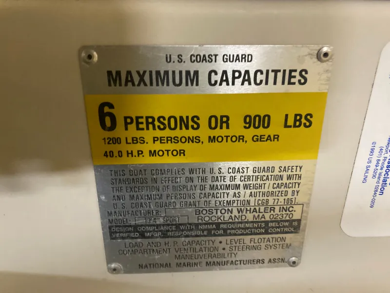 Slide: The Image of USCG capacity plate for Boston Whaler 13 Sport, 1989. - 14